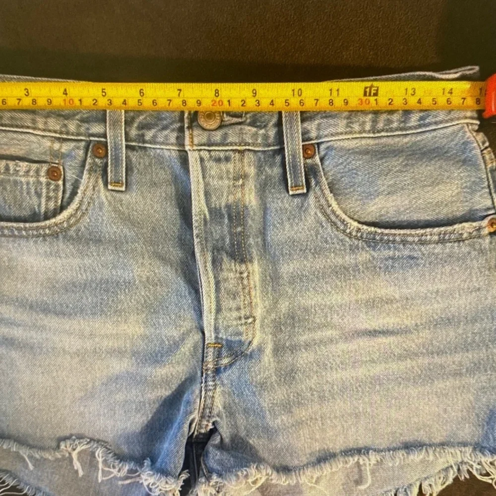 Levi's Light Wash Frayed Hem Denim Shorts - Picture 5 of 8